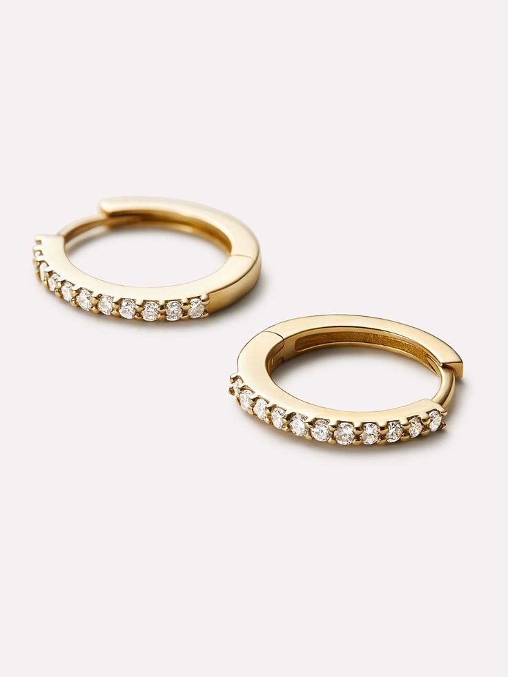 These gold diamond huggie hoops feature 100% recycled solid gold and lab-grown diamonds for the sustainable flex of your dreams. Elevate your ear game with these delicate yet dazzling hoops even the planet can love. Keep the solid gold vibes going and pair with our super chic and timeless Gold Ring. • Made with 100% recycled, waterproof solid gold • Features lab-grown diamonds for that extra sparkle • Pairs well with our solid gold collection Huggie Earrings Gold, Diamond Huggie Earrings, Huggie Earrings, Gold Collection, Letter Necklace, Huggies Earrings, Gold Ring, Lab Grown, Lab Grown Diamonds