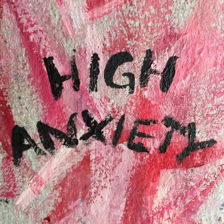 the words high and low are painted on a piece of pink paper with black ink