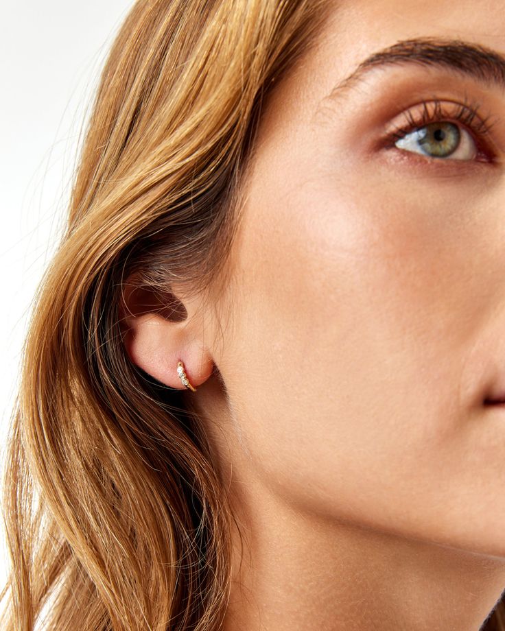 Rooted in simplicity and elevated by diamonds, The 3 Dot Diamond Earrings are the perfect elegant touch to any collection. Available in 14K Recycled Gold and set with 3 ethically sourced diamonds, these earrings are perfect for when you want a little touch of sparkle that isn’t too much. Available in 14K Yellow Gold, 14K White Gold, and 14K Rose Gold. DETAILS Available in 14K Recycled Gold Set with 0.10 TCW Diamonds High-quality diamonds (Vs2-Si1) Conflict-free only Minimalist Rose Gold Hoop Earrings With Diamond Accents, Minimalist Rose Gold Diamond Huggie Earrings, Dainty Rose Gold Diamond Earrings For Everyday, Minimalist Rose Gold Earrings With Single Diamond, Minimalist Rose Gold Diamond Earrings With Accents, Minimalist Rose Gold Diamond Earrings With Single Diamond, Modern Rose Gold Earrings With Single Diamond, Everyday Dainty Rose Gold Diamond Earrings, Rose Gold Minimalist Diamond Earrings For Pierced Ears