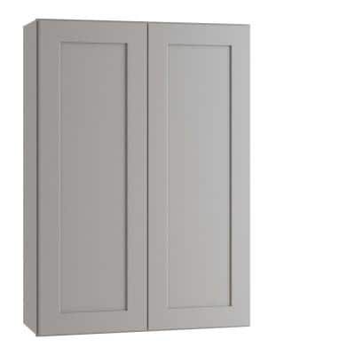 a white cabinet with two doors on the front and one door open to reveal an empty space