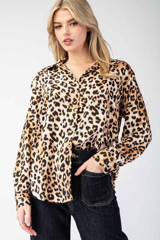 Unleash your wild side with our Leopard Printed Button Front Blouse Top. Show off your fierce style with this playful top that is perfect for any occasion. With a button front and stylish leopard print, this top will take your outfit to the next level. Upgrade your wardrobe today! Fabric contents: -100% Polyester Leopard Print Long Sleeve Top With Buttons, Long Sleeve Leopard Print Top With Buttons, Casual Collared Leopard Print Tops, Trendy Long Sleeve Leopard Print Top, Trendy Long Sleeve Leopard Print Blouse, Leopard Print Button-up Top With Buttons, Leopard Print Button-up Top, Fall Leopard Print Tops With Buttons, Fall Tiger Print Tops