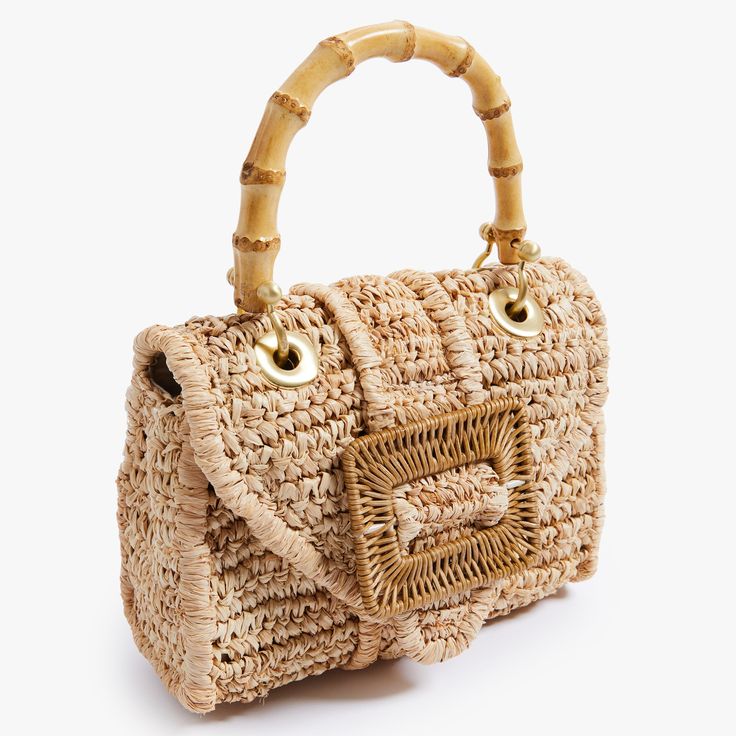 Timeless and posh, Pamela Munson’s straw accessories are beloved by island hoppers and city dwellers alike. Her bags reinterpret straw as a natural, sustainable material that can be worn any season, anywhere. Finally, a gold minaudière that goes with everything. This handwoven raffia handbag is expertly crafted and beautifully finished with brushed gold mini hardware, bamboo and rattan. Every detail is considered with special attention to function and versatility. Named after Pamela’s grandmothe Straw Accessories, Brushed Gold Hardware, Bamboo Top, Mini Handbag, Bamboo Handles, Mini Handbags, Accessories Branding, Gold Hardware, Mini Bag