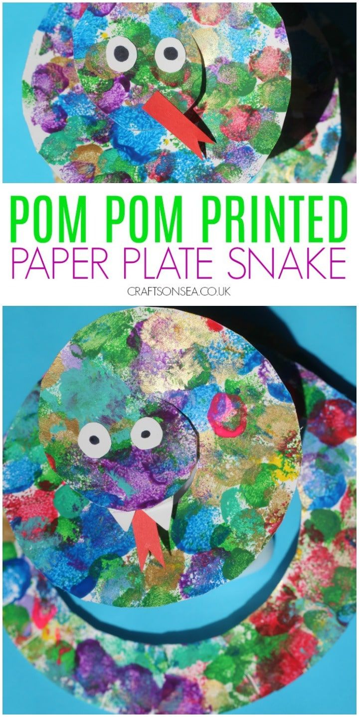 the paper plate snake craft is made with pom poms