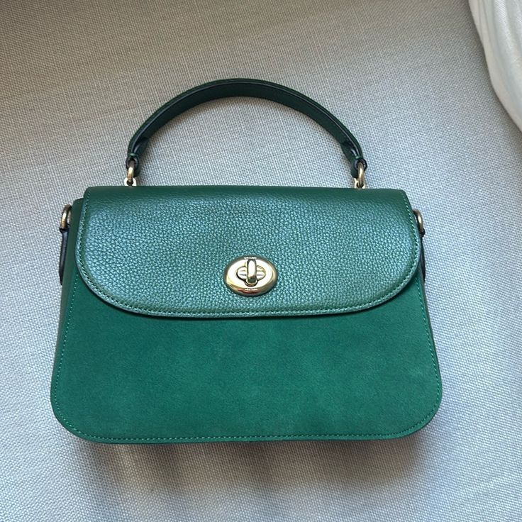 Pristine Condition Never Used. Strap Included. Elegant Green Flap Bag For Daily Use, Green Coach Shoulder Bag For Evening, Elegant Green Flap Bag With Gold-tone Hardware, Coach Green Bags With Detachable Strap, Green Coach Bag With Detachable Strap, Green Coach Bag For Everyday Use, Coach Bag With Magnetic Closure For Daily Use, Formal Green Coach Bag, Green Coach Top Handle Shoulder Bag