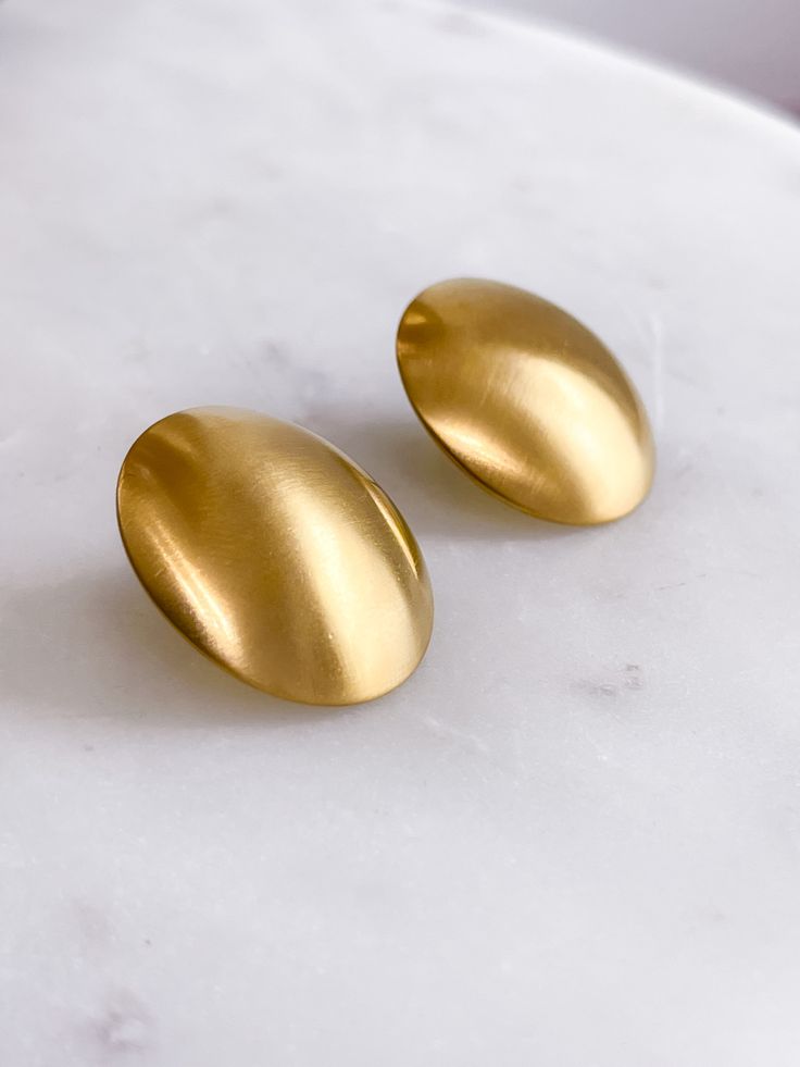 Stainless steel. Minimalist Metal Earrings With Shiny Finish, Everyday Metal Earrings With Shiny Finish, Everyday Metal Earrings With Polished Finish, Modern Oval Metal Earrings, Everyday Polished Brass Earrings, Everyday Brass Earrings With Polished Finish, Nickel-free Stainless Steel Modern Earrings, Tarnish Resistant Oval Metal Earrings, Modern Handmade Stainless Steel Earrings