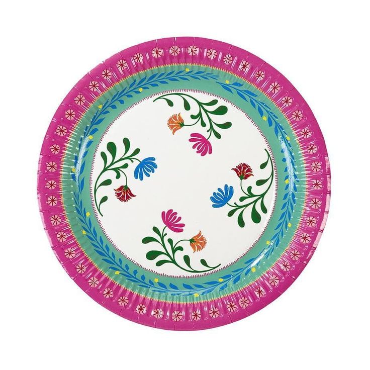 a pink and blue plate with flowers on the rim, decorated with floral designs in different colors