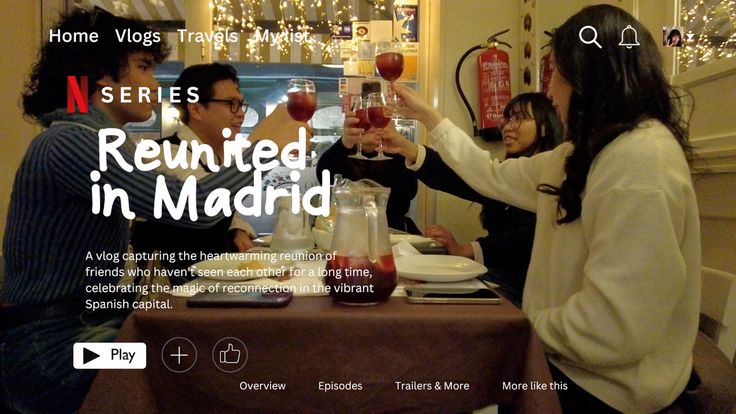 a group of people toasting wine glasses at a table