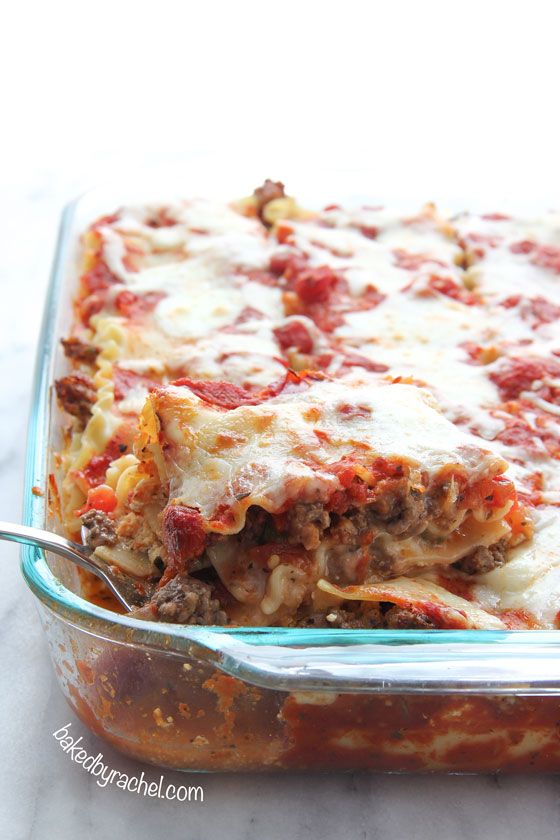 a casserole dish with meat, cheese and sauce in it is ready to be eaten