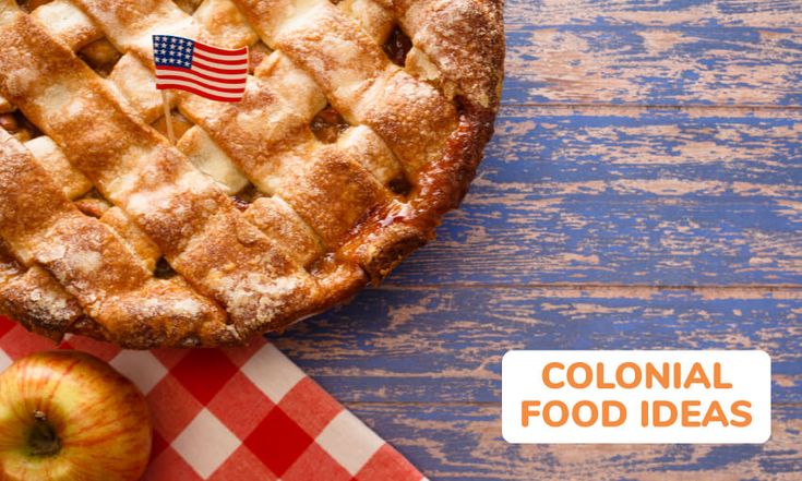 an apple pie with the american flag on it and a checkered table cloth next to it