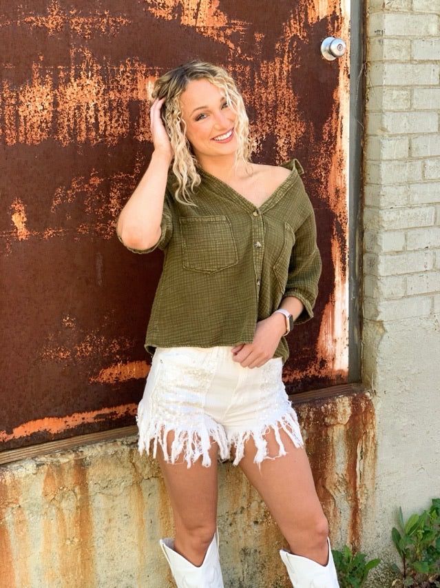 HELLO BRIDES!!! Looking for some cute yet unique shorts? Look no further, SGA has you covered. These denim shorts are a must have and we'll tell you why. They feature the most unique distressing along with a little glam.. SEQUINS! Who doesn't love sequins? The sequin detailing is on the front and the back pockets. Curly fringe detailing on the hem. They are a mid rise fit with no stretch. Abby is 5'7 wearing the small making these true to size. GENERAL SIZE CHART: 2-4 SMALL, 6-8 MEDIUM, 10-12 LA Cutoff Tops With Frayed Hem For Day Out, Cotton Shorts With Frayed Hem For Vacation, Spring Distressed Cotton Shorts, Trendy Distressed Cutoff Tops, Summer Distressed Cotton Shorts, Distressed Cotton Summer Shorts, Cotton Cutoff Jean Shorts For The Beach, Beach Cotton Shorts With Frayed Hem, Cotton Beach Shorts With Frayed Hem