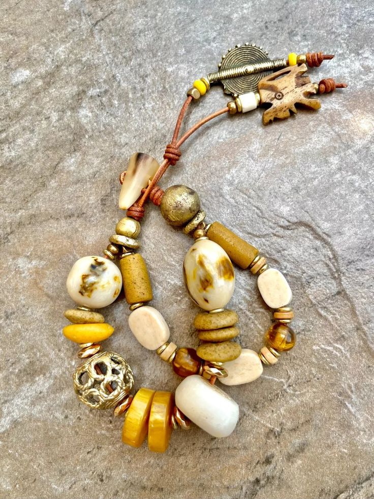 Bohemian Chic Bracelet Vintage Resin and African Tribal Beads | eBay White Bohemian Jewelry With Large Beads, Bohemian Amber Jewelry For Beach, Bohemian Bracelets With Large Beads For Healing, Bohemian Healing Bracelets With Large Beads, Spiritual Beaded Bracelets With Large Beads For Beach, Spiritual Polished Beads Jewelry For Beach, Spiritual Large Beaded Bracelets For Beach, Spiritual Beach Jewelry With Polished Beads, Spiritual Large Beads Jewelry For Festivals