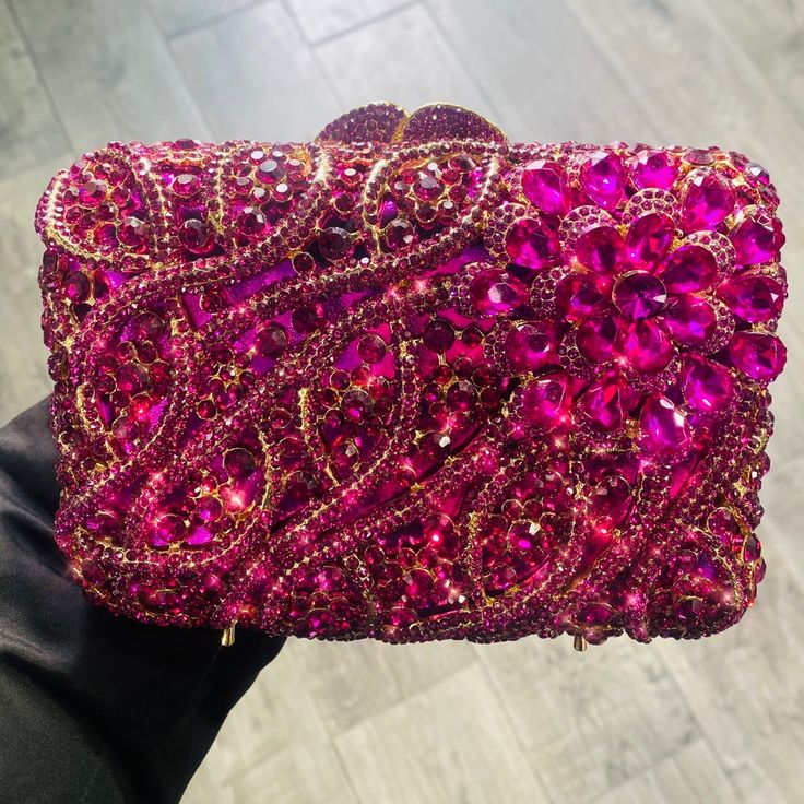 Add Some Sparkle To Your Style With This Lovely Crystal Rhinestone Clutch. It Makes A Beautiful Statement Piece. 100% Handmade. Crystals Shine Beautifully In Any Light. You’re Sure To Catch Eyes And Get Compliments Wearing This Cute Bag! Suitable For Any Event Or Night Out. Great For A Gift Idea. Extra Crystals & Rhinestones Are Included. Gold Interior Removable Chain Snap Lock Closure (Please Allow 7-10 Business Days For Shipping & Handling) All Sales Are Final. Items Are Quality Checked Before Pink Crystal Embellished Evening Bag For Formal Occasions, Pink Crystal Embellished Evening Bag For Formal Events, Glamorous Crystal Evening Bag With Rhinestones, Glamorous Crystal Evening Bag With Bling, Pink Rhinestone Clutch For Events, Pink Rhinestone Clutch For Evening, Luxury Pink Rhinestone Evening Bag, Pink Crystal Embellished Party Evening Bag, Bedazzled Rectangular Evening Bag For Parties