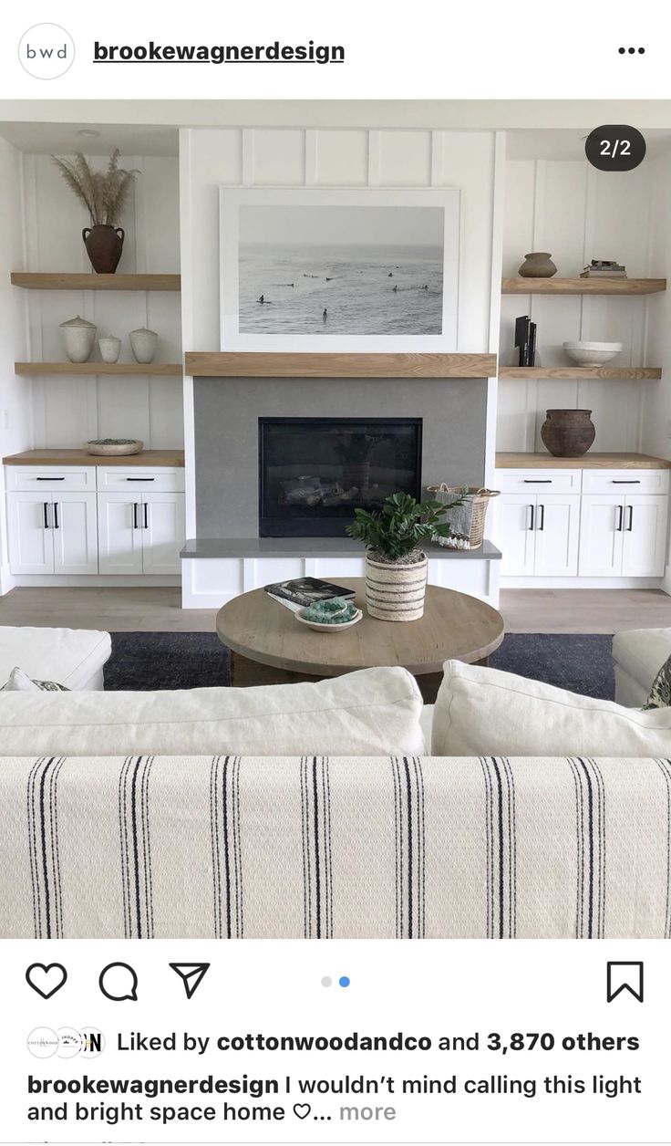 a living room filled with furniture and a fire place in front of a tv mounted above a fireplace