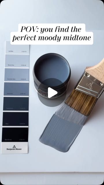 a paint can and brush next to some different color swatches on a white surface