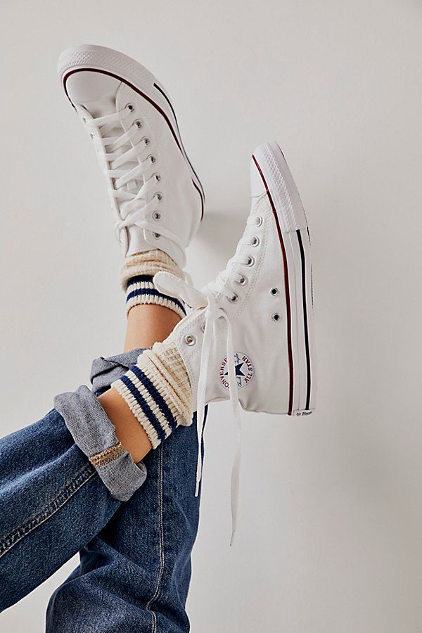 **Fit:** This style is in unisex sizing so a men's size 4 is a women’s size 6. Classic canvas high top Chuck Taylors. | Chuck Taylor All Star Hi Top Converse Sneakers at Free People in White, Size: 3 M Winter Converse Sneakers With Vulcanized Sole, White High-top Sneakers For Fall, White High Ankle Sporty Sneakers, Everyday High-top Sneakers With Vulcanized Sole, White Ankle-high High-top Sneakers For Winter, Sporty Converse High-top Winter Sneakers, Casual High-top Sneakers With White Laces, Sporty Winter High-top Converse Sneakers, Everyday High-top Sneakers