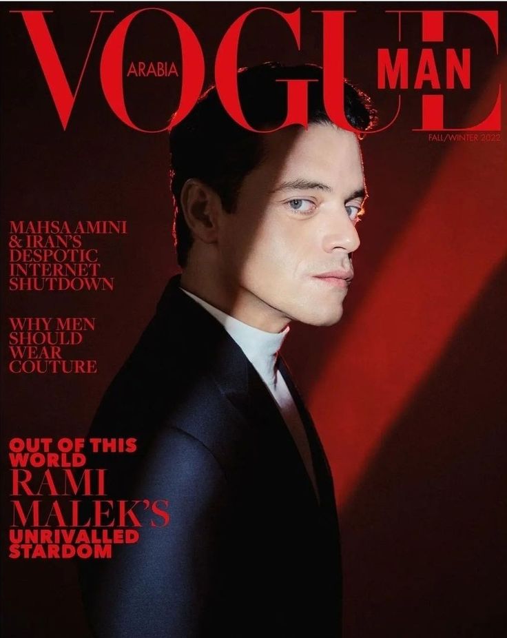 a man in a suit on the cover of a magazine