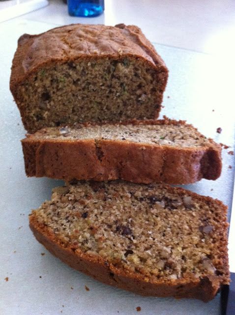 two slices of banana bread sitting on top of a cutting board