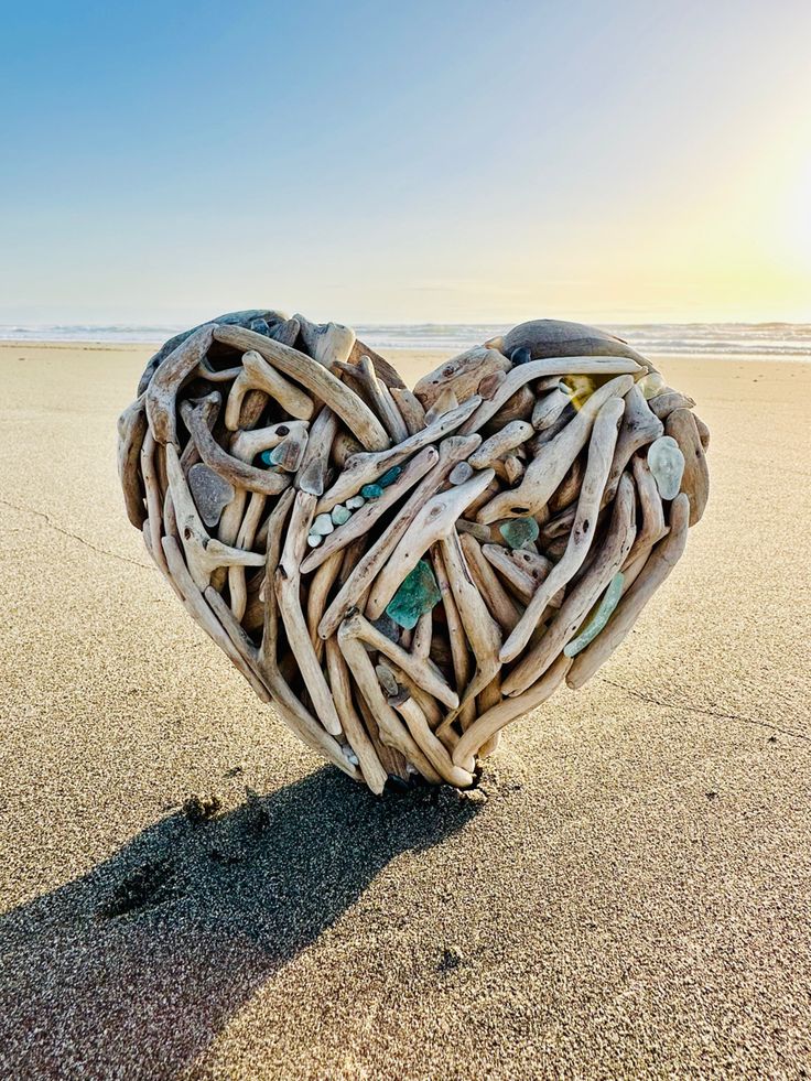 Driftwood heart with sea glass details 
#driftwoodart Driftwood Heart Wall Art, Driftwood Heart Diy, Driftwood Heart, Oyster Art, Driftwood Art Diy, Driftwood Wall Art, Heart Mirror, Driftwood Decor, Coastal Beach Decor