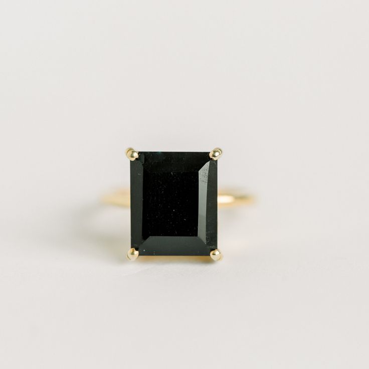 an image of a black stone ring