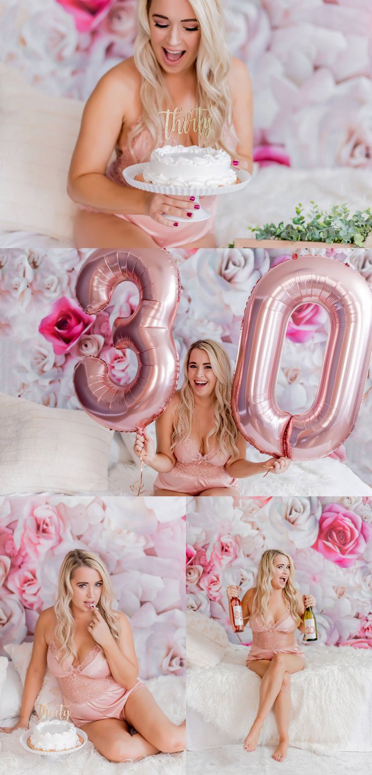 a woman sitting on top of a bed holding a cake