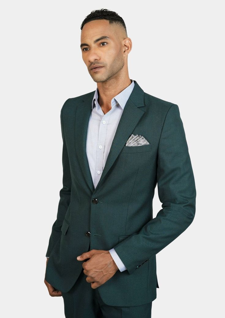 A popular favorite, the distinctive Sacramento green wool suit is bold in color with a premium fabric blend. This suit has it all. Make it yours today. Fitted Dark Green Business Suit, Green Office Blazer With Suit Collar, Elegant Green Business Casual Suits, Tailored Dark Green Business Suit, Elegant Tailored Dark Green Blazer, Green Blazer With Welt Pockets For Business, Classic Dark Green Semi-formal Suits, Green Office Blazer With Pressed Crease, Classic Dark Green Business Suit