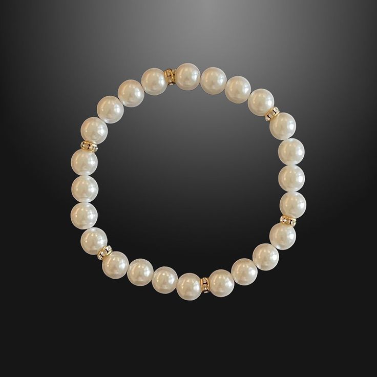 In a world saturated with mediocrity, nothing can rival the authenticity of traditional luxury. This subtly opulent bracelet showcases genuine white freshwater pearls, elegantly interspersed with lab diamond studded rondelles in gold. Hand-strung with care in our Orlando studio, this stretch bracelet adjusts over the wrist for easy transitions and offers versatile styling options with a comfortable wear. Our Men's Pearls Collection, features sophisticated fresh water pearl necklaces and bracelet Elegant Luxury Hand-strung Pearl Bracelet, Luxury White Beaded Bracelets With Pearl Chain, Luxury Gold Beaded Bracelets, White Pearl Chain Jewelry For Everyday Elegance, White Jewelry For Everyday Elegance, Classic White Jewelry For Everyday, Classic White Jewelry For Everyday Elegance, Formal Pearl Beaded Bracelets With Pearl Chain, Formal Pearl White Bracelet With Pearl Chain