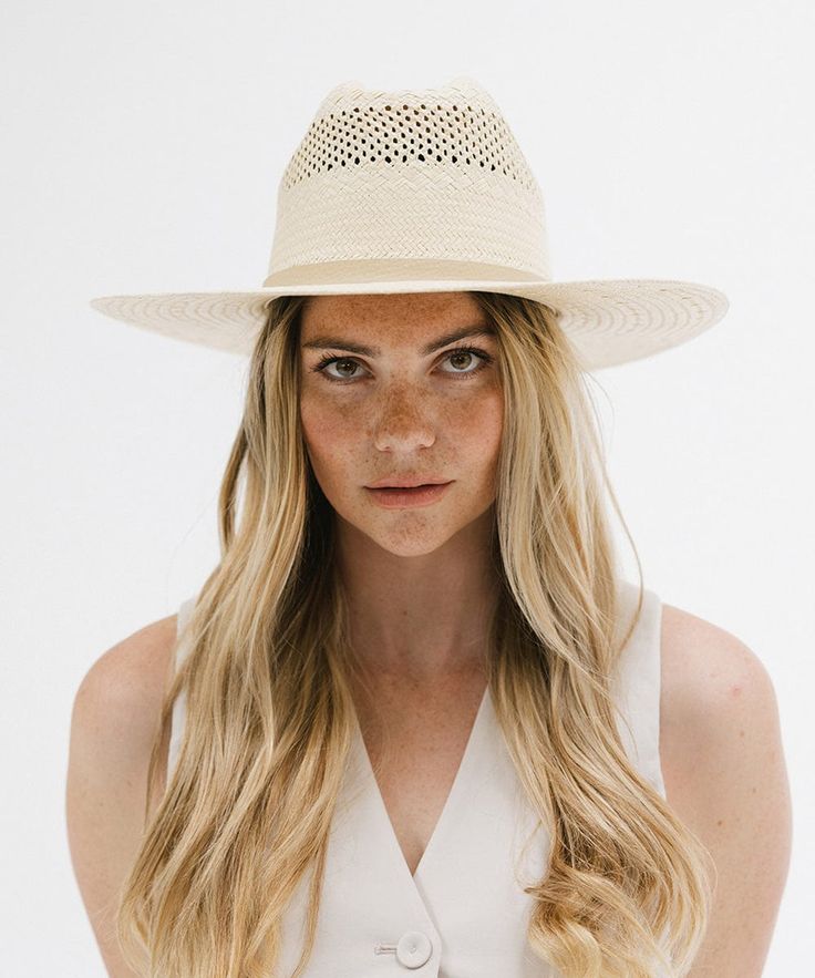 Clark is a modern take on an approachable western style with a cattleman crown. Crafted from hand woven paper straw this style features a venting pattern in the crown to keep the head cool all summer long. The tonal leather band is attached and serves as a sleek finish. Make it a look + shop western inspired hat bands HERE! Classic Hat Bands For Ranch In Spring, Classic Hat Bands For Spring Ranch, Western Braided Hats For Spring, Western Style Panama Hat For Ranch In Spring, Natural Color Panama Hat For Spring Ranch, Natural Panama Hat For Spring Ranch Occasion, Flat Brim Panama Hat For Spring Ranch, Spring Panama Hat For Ranch, Spring Flat Brim Panama Hat For Ranch