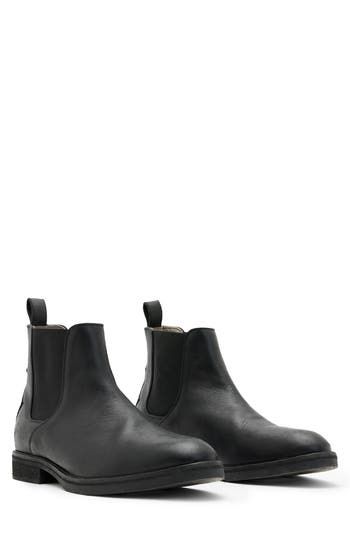 Elevate your closet staples with this sleek leather Chelsea boot featuring Western-inspired paneling at the heel and a rugged rubber sole. 5 1/2" shaft Lace-up style Leather and textile upper and lining/rubber sole Made in Portugal Chelsea Boots With Rubber Heel Cap For Workwear, Reinforced Heel Ankle Waterproof Boots For Workwear, Western Style Plain Toe Work Boots, Waterproof Ankle Boots With Reinforced Heel For Work, Classic High Ankle Moto Boots With Reinforced Heel, Classic Moto Boots With Reinforced Heel, Casual Leather Boots With Rubber Heel Cap, Workwear Boots With Moc Toe And Reinforced Heel, Waterproof Workwear Boots With Vibram Sole And Round Toe