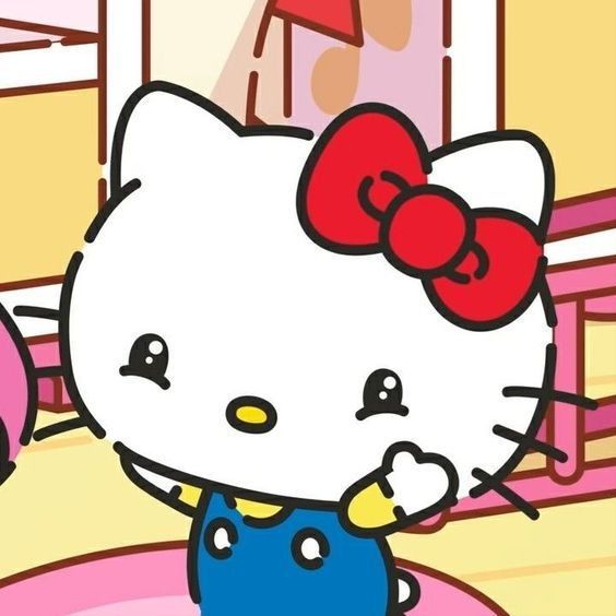 an animated hello kitty is standing in front of a pink table with blue and yellow plates on it