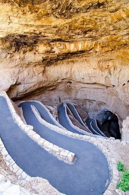 an image of a road going into a cave