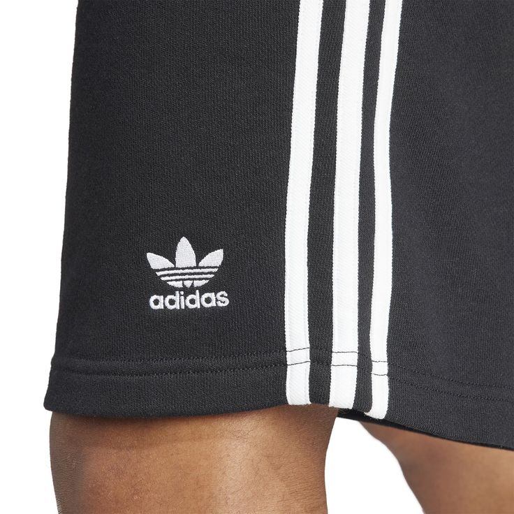 Three stripes for the win! In the adidas 3-Stripe Men's Shorts, you'll be repping your brand with these shorts that are so obviously adidas with their three-stripes. The elastic waistband means they'll stay up well but doesn't require you to be uncomfortable with a button or tight fit. These are ideal for on and off the court and are easy to match with a tee or even a hoodie (if you're into that look in the winter).Features: Features three stripes down side. Has adidas logo on the leg. Elastic w White Kicks, Adidas Shorts, Adidas Outfit, Designer Shorts, Short Jacket, Striped Shorts, Dress With Boots, Classic Looks, Mens Shorts