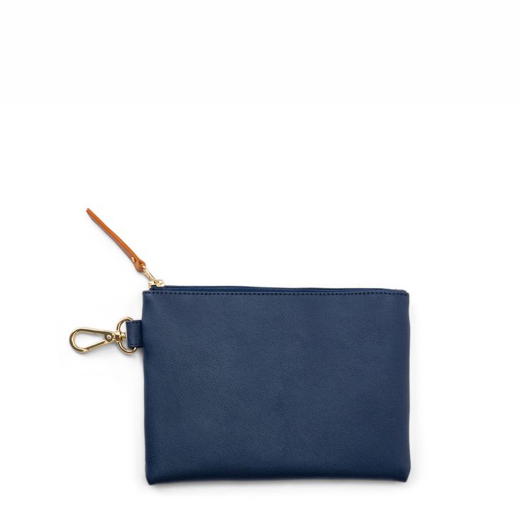 a small blue purse with a keychain hanging from the front, on a white background