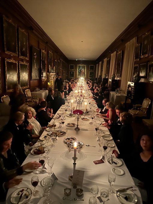 a long table with many people sitting at it