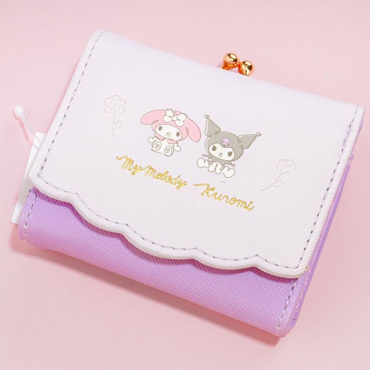 Bring this kawaii wallet when you go shopping with your besties! It's decorated with an illustration of My Melody and Kuromi with some engraved flowers. The wallet comes with three note pockets and a clasped-back coin purse! Made from synthetic leather Kawaii Wallet With Card Slots, Kawaii Rectangular Wallets With Card Slots, Pink Rectangular Kawaii Wallet, Kawaii Coin Purse With Card Slots For Gift, Cute Compact Wallet For Daily Use, Cute Compact Wallets For Daily Use, Kuromi Wallet, Kawaii Wallet, My Melody And Kuromi