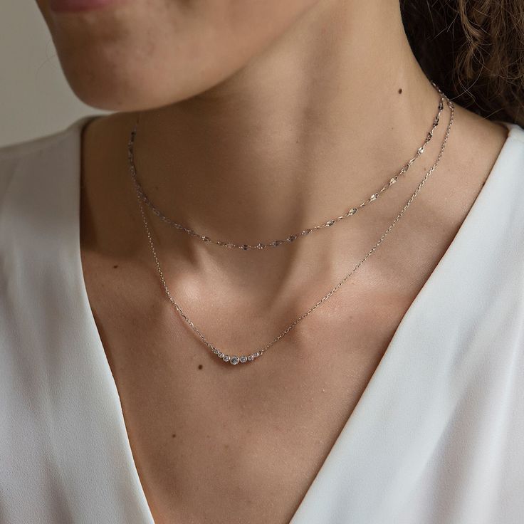 This dainty choker from our signature O Collection, is an intricate Italian Lace chain. Pair it with other necklaces from this collection. Our patented connectors let you easily link and layer necklaces in any order you desire. Learn more .925 Sterling Silver, width 2mm Adjustable chain: 13-16in (33-40cm), 15-18in (38-46cm) Gold Vermeil Spring clasp closure Hypoallergenic, lead and nickel free #035S Layer Necklaces, Layered Choker Necklace, Silver Necklace Set, Curved Bar, Dainty Choker, Silver Bar Necklace, Layered Necklaces Silver, Gold Bar Necklace, Necklace Sets