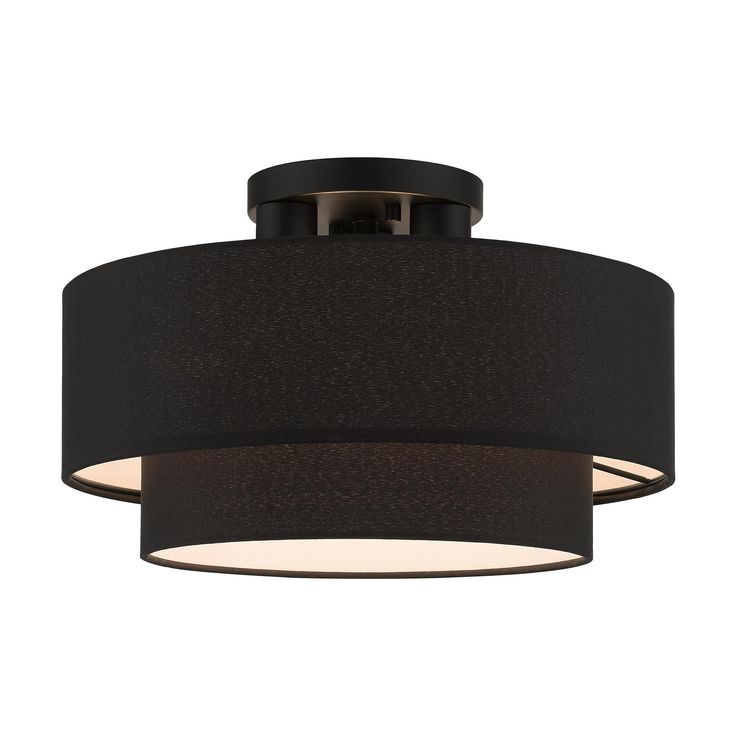 a black ceiling light with a round shade on the bottom and two lights above it