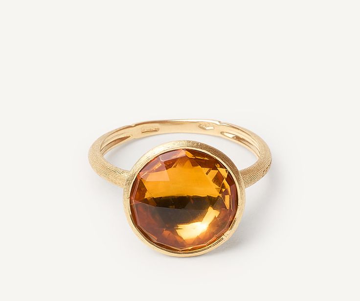 Boasting bright colors and clean lines, this ring is embellished by a carefully selected semi-precious gemstone, encircled in an 18K yellow gold bezel setting, hand-engraved using an ancient Florentine technique. It is perfect on its own or matched with the other colors in the collection. New Zealand Jewellery, Yellow Quartz, Marco Bicego, London Blue Topaz Ring, Quartz Ring, Blue Topaz Ring, London Blue Topaz, High Jewelry, Hand Engraving