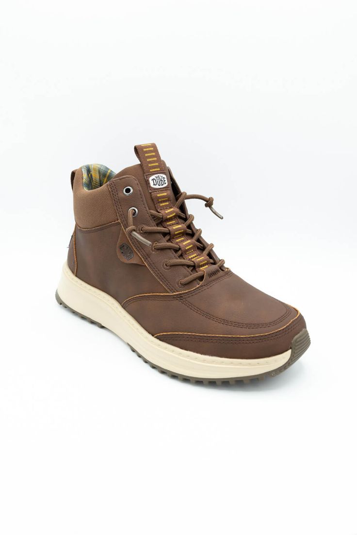 Slip into something stylish and comfortable this season like our HEYDUDE Men’s Tahoe Classic Boots in Brown! These trendy boots feature a lightweight construction, slip on design, and water-repellant uppers. Grab your new favorite pair of casual shoes today! Features: HEYDUDE Shoes Style: 42059-255 Color: Brown Men’s boots Stretch Lace Elastic laces Upper treated with water repellent spray Plaid print inside Pull tab Easy-on system Removable foam insole Slip-On *If you usually wear half sizes, HEYDUDE suggests choosing the next size up for best fit in this style Wondering about the size conversion between women's, men's & youth shoes? Check out this HEYDUDE Shoes Size Conversion Chart. Heydude Shoes, Animal Shoes, Trendy Boots, Men’s Boots, Youth Shoes, Swim Shoes, Sneaker Slippers, Shoe Boot Sandals, Conversion Chart