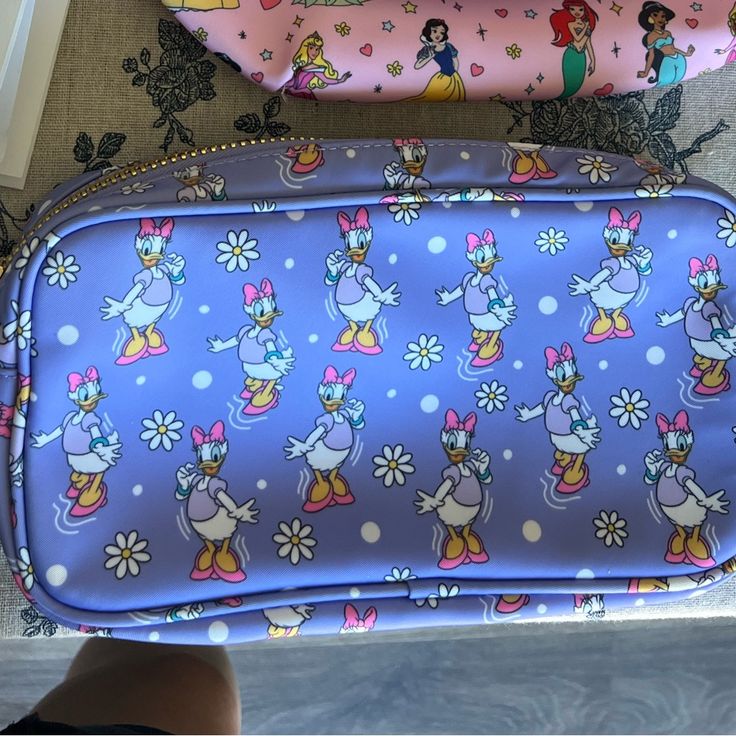 Daisy Small Pouch Nwot. Smoke And Pet Free Home Purple Rectangular Travel Cosmetic Bag, Cute Purple Pouch Bag, Purple Bag With Zipper Pouch For Daily Use, Daily Use Purple Bag With Zipper Pouch, Purple Zipper Pouch Travel Bag, Purple Rectangular Travel Pouch, Purple Travel Bag With Zipper Pouch, Purple Travel Cosmetic Bag With Removable Pouch, Rectangular Purple Travel Pouch