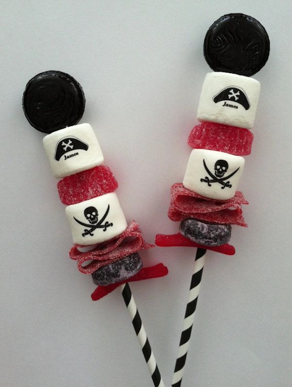 two marshmallows with pirate decorations on them