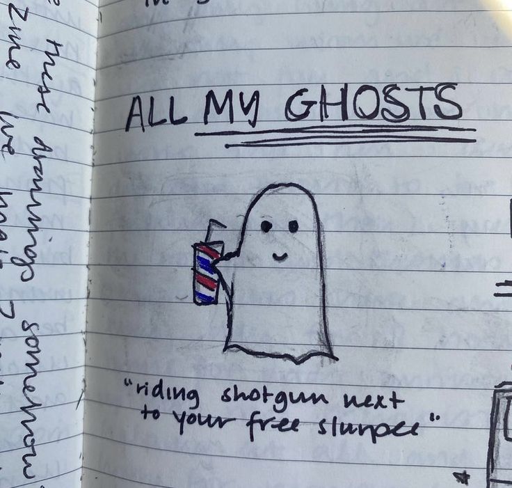 an open notebook with writing on it that says all my ghosts