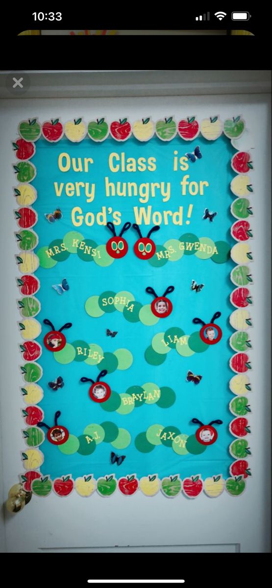 an apple themed bulletin board with the words our class is very hungry for god's word