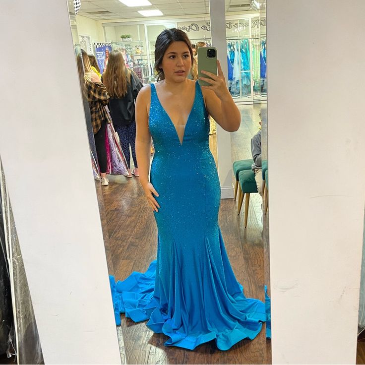 Size 10 Blue Sherri Hill Dress Never Worn Outside Of Store Blue Prom Season Evening Dress, Turquoise Evening Dress For Party, Blue V-neck Dress For Prom, Blue V-neck Dress For Prom Season, Blue V-neck Evening Dress For Prom, Blue V-neck Evening Dress For Prom Season, Blue V-neck Evening Dress For Cocktail, Blue V-neck Evening Dress For Formal Occasions, Blue V-neck Cocktail Evening Dress