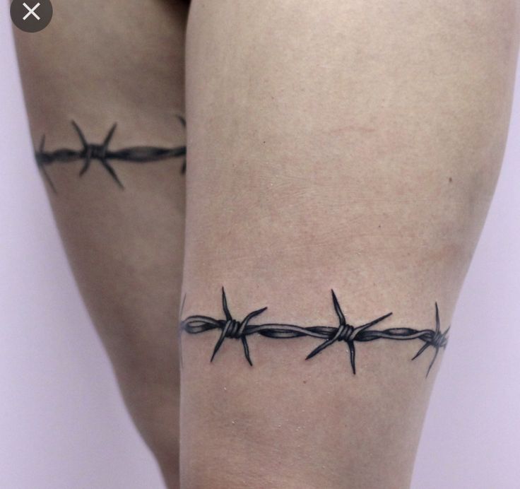 Barbed wire tattoo Thigh Barb Wire Tattoo, Barbwire Leg Tattoo, Barbwire Tattoo Thigh, Barbed Wire Tattoo Thigh, Garder Belt Tattoos Women, Barbwire Tattoo Around Thigh, Goth Shin Tattoo, Barbed Wire Leg Tattoo, Tattoo Back Of Thigh