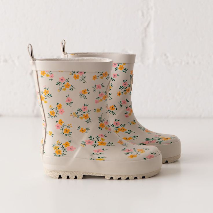 Our waterproof rubber rain boots are a great accessory year-round for your kids. Key features of our rain boots: -Available in sizes Toddler 4-Big Kid 4. -Three new colors including our first ever floral rain boot. -Matte rubber finish on the outside and soft, cotton lining on the inside. -Easy-on making them the best shoe for kids. They slide right on! -Perfect for boys or girls. -Rain boot sizing is true-to-size. Playful Non-slip Round Toe Rain Boots, Cute Rain Boots For Kids, Rain Boots For Kids, Floral Rain Boots, Boys Rain Boots, Toddler Rain Boots, Kids Rain Boots, Home Clock, Rain Boot