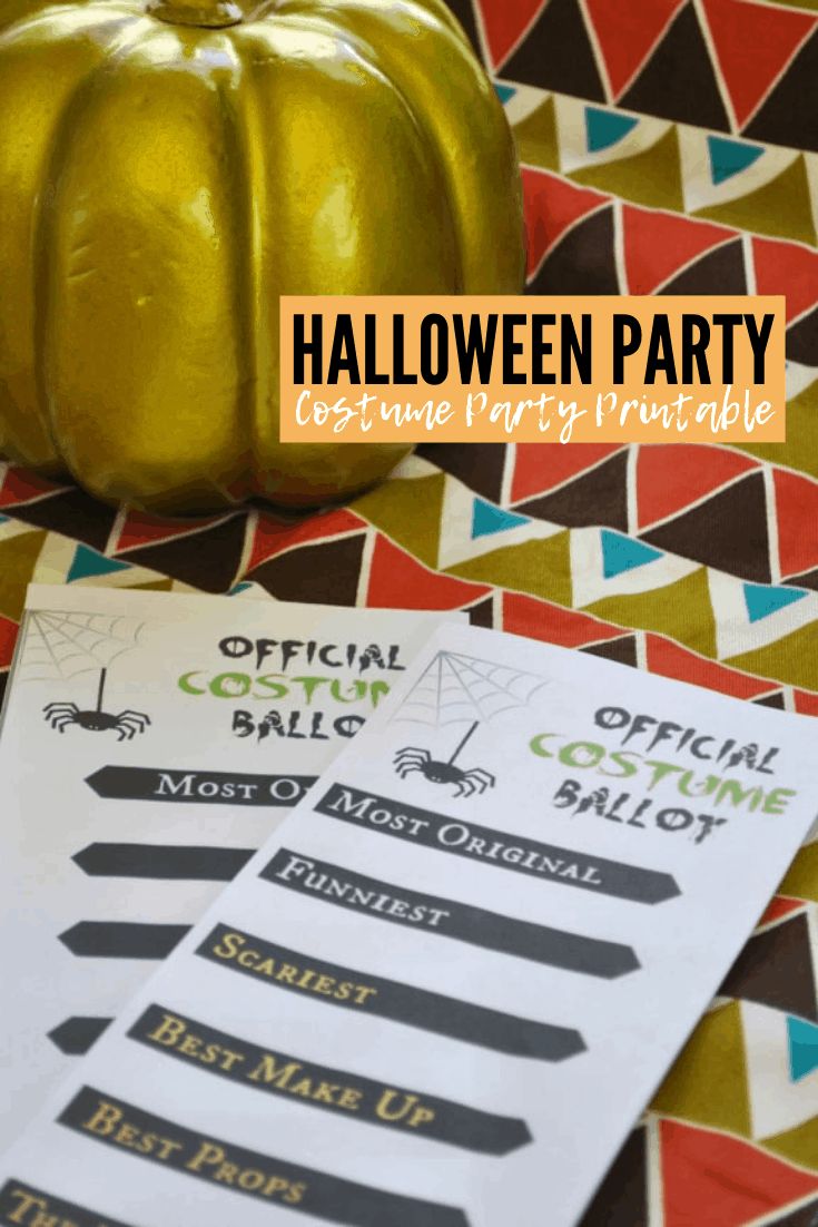 an orange pumpkin sitting on top of a table next to a paper with the words halloween party