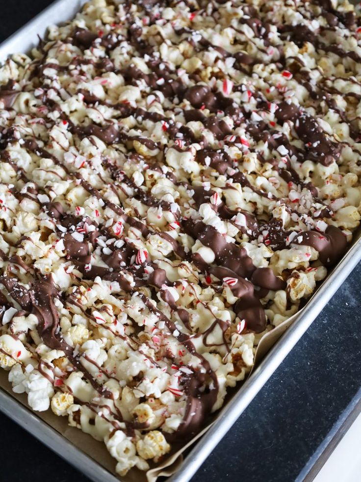 a baking pan filled with chocolate and marshmallows