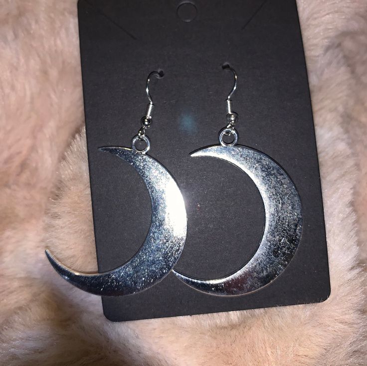 Silver moon earrings Silver Moon-shaped Jewelry For Party, Silver Moon Shaped Jewelry For Party, Silver Moon-shaped Party Jewelry, Crescent Moon Charm Jewelry For Parties, Crescent Moon Phase Jewelry For Party, Crescent Moon Charm Party Jewelry, Silver Crescent Jewelry For Party, Nickel Free Metal Moon Earrings, Metal Moon-shaped Hoop Earrings