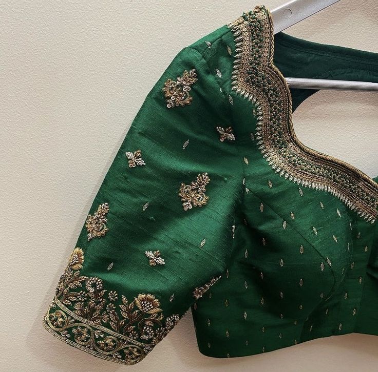 Hand embroidered ready made bridal saree blouse / crop top/stitched saree blouse usa / green saree blouse/ hand embroidered blouse/zardosi blouse/pink saree blouse/ pure silk bridal wedding blouse/ heavy embroidery maggam work blouse        It is very true that a perfect blouse is the one which makes your saree look stand out !! If you find one of such a style that you have been wanting to have then dont let it go !! we carry such unique trending blouses that instantly add a stylish look to any saree !!     Well..!! we understand that you may not get in your desired size/pattern, here you go with customization according to your size/pattern which we can deliver in 1-2 weeks of time period !!      Here is a beautiful Hand embroidered saree blouse in green color that has heavy bridal or wedd Zardosi Blouse, Hand Embroidery Blouse, Green Blouse Designs, Maggam Blouse, Hand Embroidered Blouse, Wedding Ready, Latest Model Blouse Designs, Perfect Blouse, Maggam Work Blouses