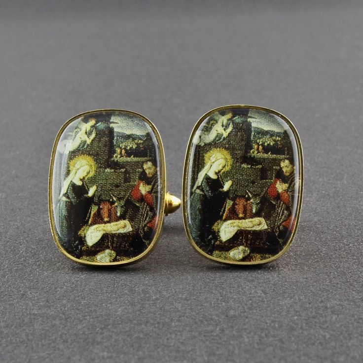 This is a divine Baby Jesus in the manger with the Virgin Mary, Joseph and the Christmas Angel nativity scene religious cufflinks. The wide oval shiny gold tone cufflinks have the scene, which may be fashioned after a great work of art, printed on paper and then set under a clear piece of lucite. A larger size, they measure 3/4 inch wide, 1 inch tall and 3/6 inch thick.  The cufflinks are in very good vintage condition. There are no identifying marks.  All items are carefully wrapped, placed in Oval Gold Cufflinks For Gift, Jesus In The Manger, The Virgin Mary, Curling Ribbon, Vintage Cufflinks, Tie Clips, Christmas Angel, Baby Jesus, Nativity Scene